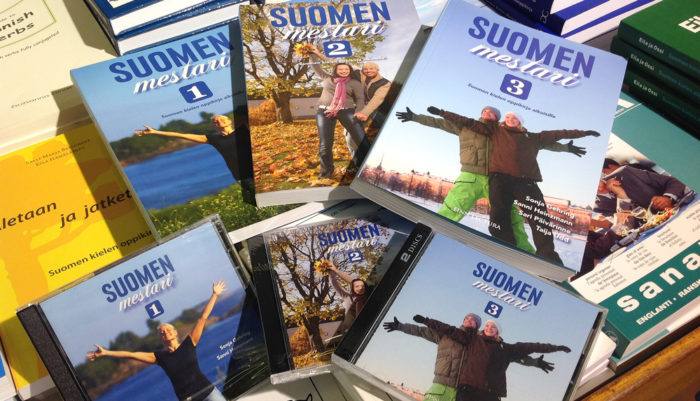 A pile of “Suomen mestari” language books.