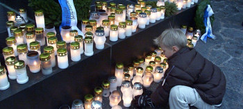 Candlelit cemetery at Christmas, Finland