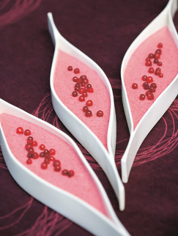 Whipped lingonberry porridge in elegant leaf-shaped bowls.
