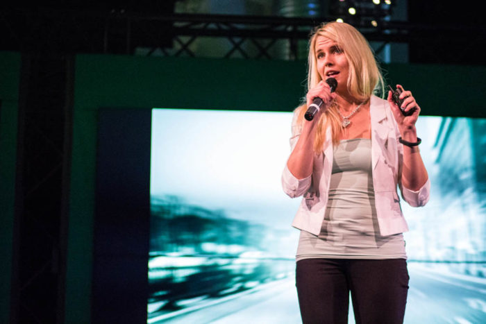 Nelli Lähteenmäki of Health Puzzle spreads the word about her company at Helsinki’s Slush event for startups and investors.