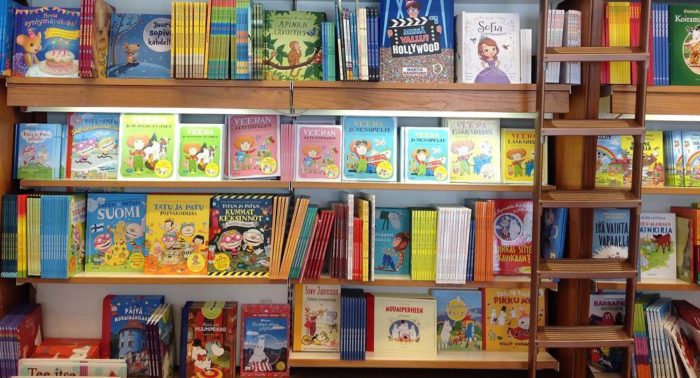 Bookstore shelves full of colourful children's books.