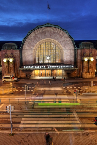 Lights go on at the Central Railway Station as dusk descends.