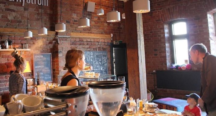 Can you spot the Uploud Audio speaker in this photo from Helsinki’s Johan & Nyström Café? It’s the unobtrusive white square on the wall (top middle).