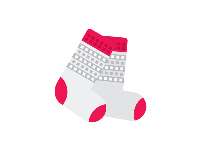A pair of white socks with red cuffs, heels and toes, and a grey pattern of squares below the cuffs.