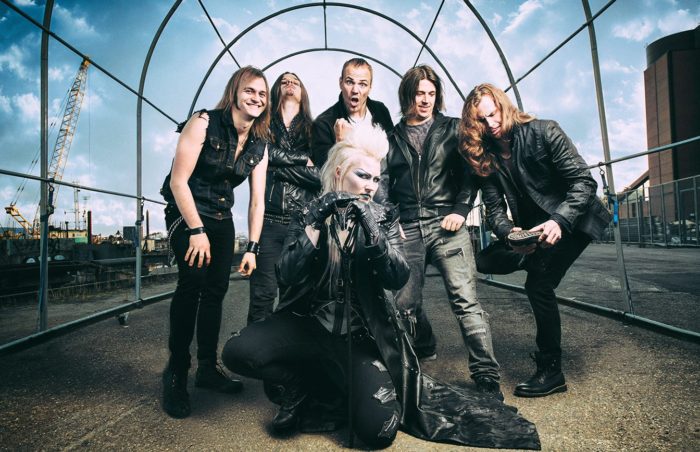 The band Battle Beast pictured outside with cranes and a worksite in the background.