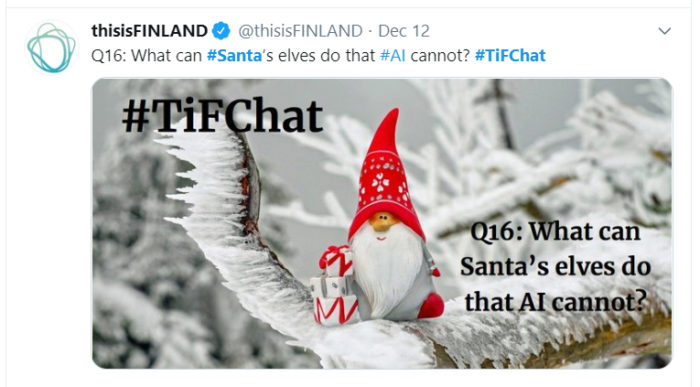 In a screenshot from Twitter, a decorative elf ornament sits on an icy tree branch.