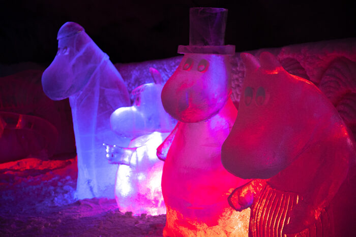A row of large ice sculptures portrays various Moomin characters from Finnish author and artist Tove Jansson's books.