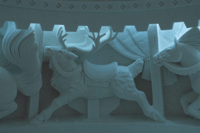 An enormous snow sculpture of a reindeer is part of an elaborate wall that is also made of snow, at the Lapland Hotels Snow Village in Kittilä, northern Finland.