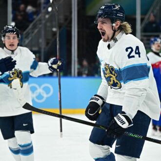 A Finnish ice hockey player Roope Hintz celebrates after scoring a goal.
