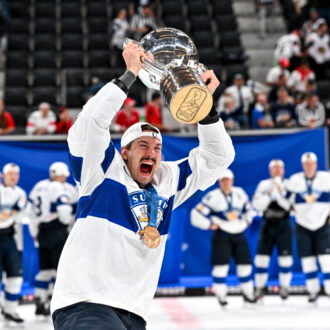 A Finnish ice hockey player Hannes Björninen celebrates after the Team Finland won the Icehockey World Championship.